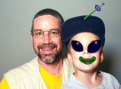 Jim and small alien at Disney's Epcot, Orlando, Florida in August 2003