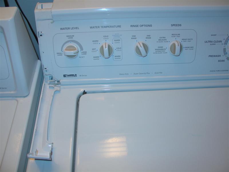 How do you remove the back of a Kenmore Series 90 dryer?